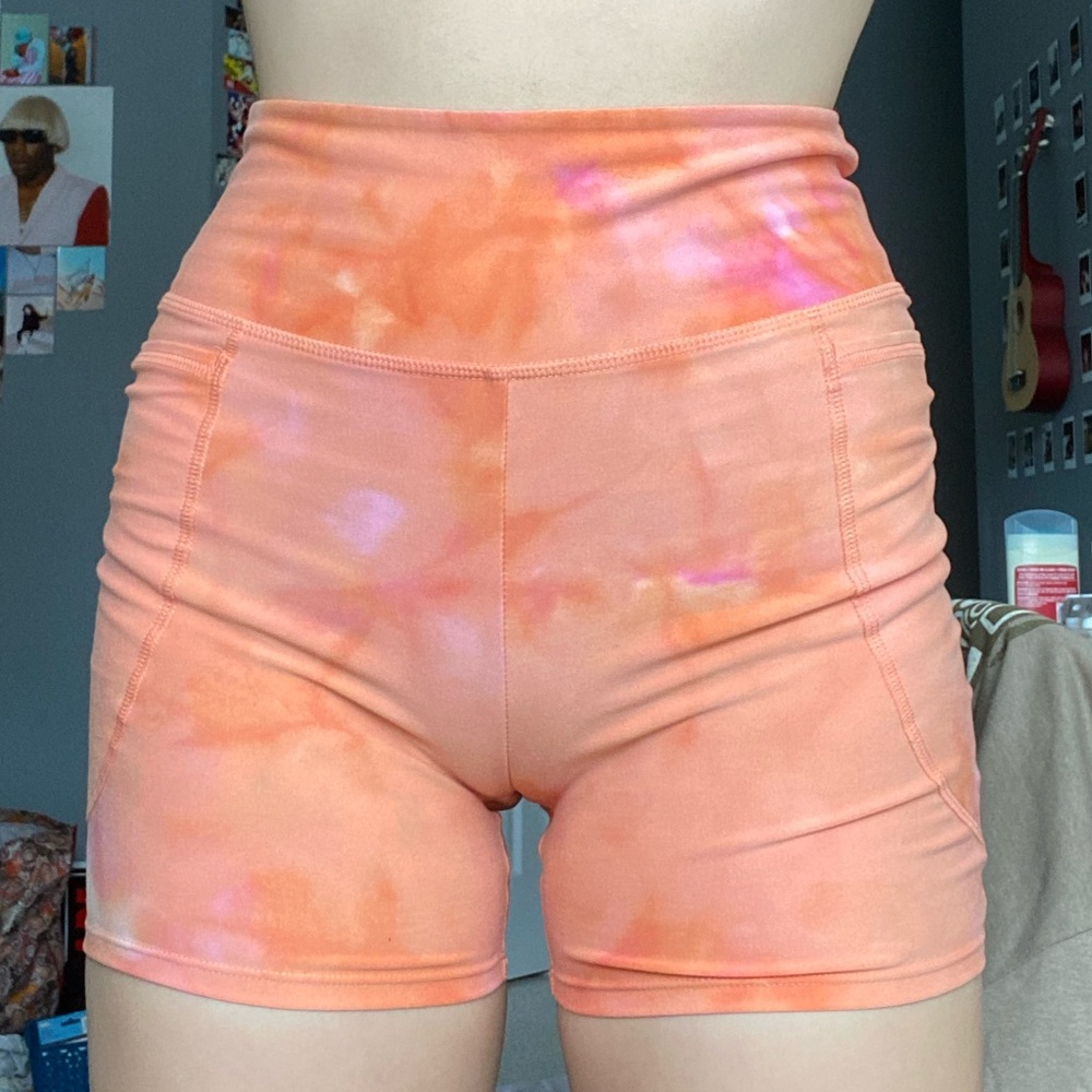 pink and orange biker shorts